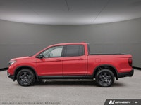 Introducing the 2026 Honda Ridgeline TrailSport AWD, a striking new truck that's unmissable in its b... (image 2)