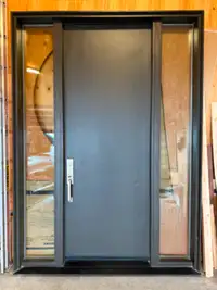 Modern steel entrance door with sidelights.