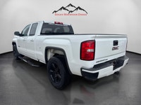 The 2019 GMC Sierra 1500 Limited 4WD Double Cab Standard Box in a striking white color is a robust t... (image 2)
