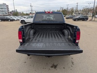 The pre-owned 2021 Ram 1500 Classic Express Crew Cab in Patriot Blue Pearl with a Black and Diesel G... (image 5)