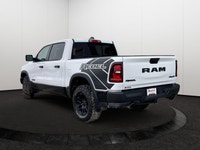 This *2025 Ram 1500 Rebel Crew Cab 4x4* in *Bright White* represents the newest chapter of Ram perfo... (image 3)