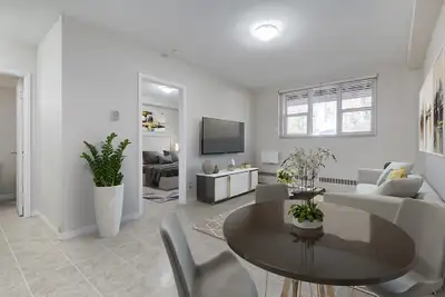 Amenities: Air Conditioning • Great Location • Heat & Water Included Suite & Building: Spacious one-...