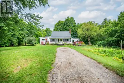 This enchanting 3-bedroom country home sits on a generous 1.5-acre lot in the heart of farm country...