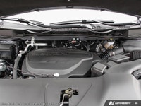 The 2026 Honda Odyssey Touring van in elegant Gray, complemented by a reliable automatic transmissio... (image 5)