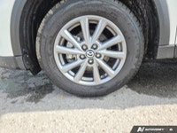 This CX-5 comes with; All Wheel Drive, Temporary Spare Tire, ABS, Aluminum Wheels, Brake Assist, Bra... (image 9)
