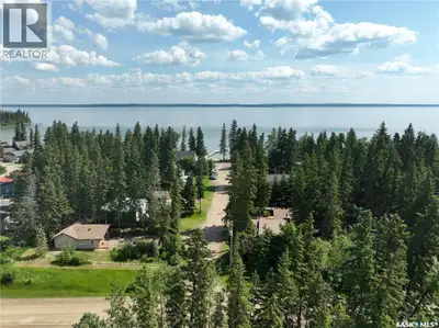Peek-a-boo Water views, beach vibes, and the perfect lake lifestyle all just down the road. This ful...