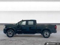 Experience heavy-duty capability and rugged refinement with the *2022 GMC Sierra 2500HD AT4*, featur... (image 1)