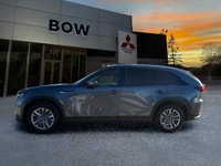 The 2025 Mazda CX-90 MHEV GS-L in a sophisticated gray finish beckons those seeking a premium drivin... (image 7)