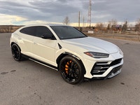 The 2019 Lamborghini Urus is a high-performance “Super SUV” featuring a 4.0L twin-turbo V8 engine pr... (image 1)