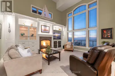 Move in to Waterfront Living and capture the breathtaking sunsets this Summer! Stunning views in you...