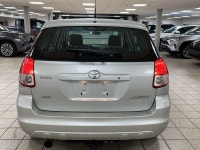 Silver light glances off the Titanium Metallic paint as it moves, the compact hatchback shape cuttin... (image 4)