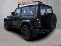 This Jeep Wrangler has a strong Regular Unleaded V-6 3.6 L/220 engine powering this Manual transmiss... (image 1)