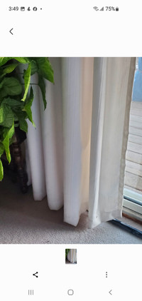 2 Sets of White curtains. 4 panels.