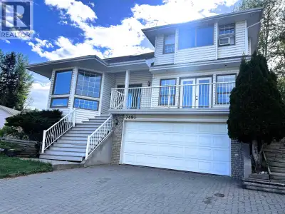 Situated in the highly sought-after Southridge neighborhood, this distinguished residence offers an...
