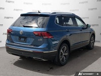 This Volkswagen Tiguan boasts a Intercooled Turbo Regular Unleaded I-4 2.0 L/121 engine powering thi... (image 5)