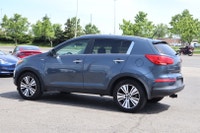 Ready to command the road? Experience the ultimate driving machine. The SPORTAGE EX AWD. A perfect f... (image 1)