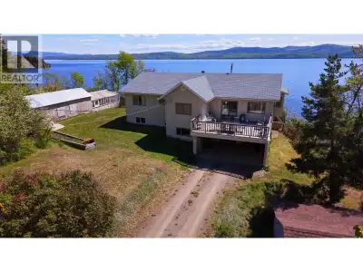 Experience breathtaking views of Francois Lake from this executive waterfront home set on nearly 2.5...