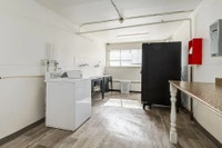 Amenities: City Views • Keyless Entry • Heat & Water Included Suite & Building: Spacious bachelor, o... (image 7)