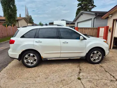 Selling my used 2007 Acura MDX. White in color and runs great. It does have some cosmetic damage, su...