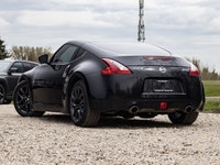 This Nissan 370Z is a sleek and sporty coupe designed for drivers who appreciate performance, style,... (image 6)