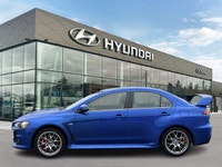 Octane Blue Pearl 4D Sedan 2.0L DOHC 5-Speed Manual AWD AWD, 4-Wheel Disc Brakes, ABS brakes, Air Co... (image 2)