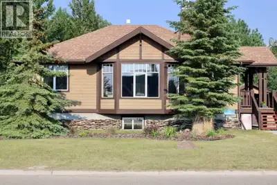 Discover this exceptional turn-key four season lake home located in Meridian Beach at Gull Lake, off...
