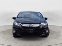 This 2020 Honda Odyssey EX-L finished in a sleek black exterior with a matching black leather interi... (image 4)