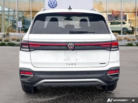 This 2025 Volkswagen Taos Comfortline, with a mere 12,750 kilometers, offers a harmonious blend of r... (image 3)