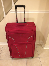 Large Suitcase Samsonite with 4 wheels in good clean condition