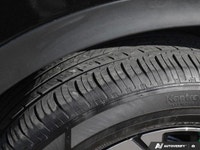 * Panoramic Moonroof * Driver Memory Seat * Heated front & rear seats * Perforated leather-trimmed s... (image 9)