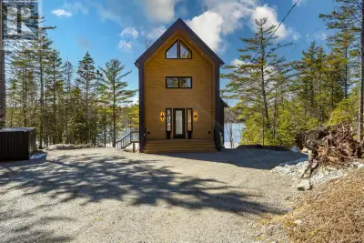 Tucked into a quiet cove on sought-after Long Lake, 179 Meek Arm Trail offers a rare blend of modern...