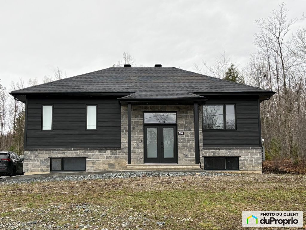 $599,000 - Bungalow for sale in St-Francois-Xavier-De-Brompton — photo 1