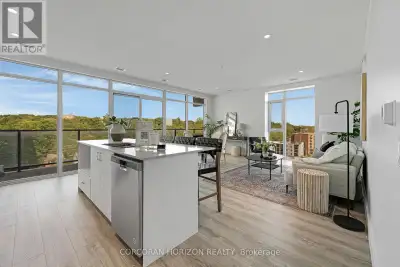 Rare Two-Bedroom Corner Unit with an included parking space in the Coveted Gaslight District! Nestle...