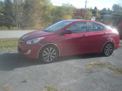 2017 HYUNDAI ACCENT SE WITH 176000 KMS. 4 CYL. AUTO. LOADED WITH OPTIONS INCLUDING POWER ROOF. HEATE...