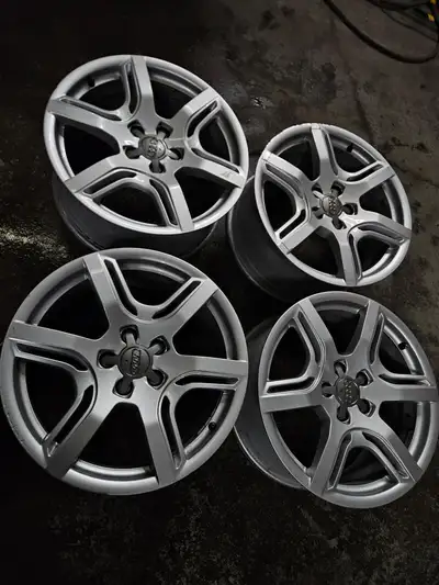 Very clean set of original Audi Q5 wheels made by Ronal. NOTE: Wheels have some minor curbrash. 18x8...