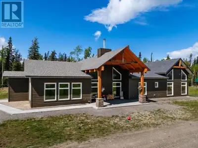 The BEST Value on the Mayo Road! 2 Homes, 2 Shops, 190 Acres bordering the Yukon River and more! Wel...