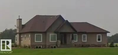 Set on 4.94 acres, this spacious bungalow offers a well-rounded acreage property with plenty of room...