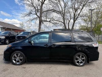 Looking for a reliable and spacious family vehicle? Check out this sleek black 2011 Toyota Sienna SE... (image 3)