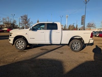 The 2026 Ram 3500 Laramie Crew Cab in Bright White combines heavy-duty capability with premium comfo... (image 2)
