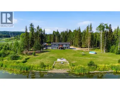Set on 5.7 private, level lakefront acres on Rose Lake, this unique property offers exceptional flex...