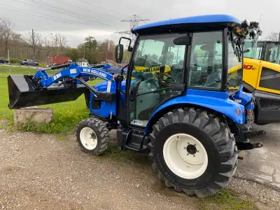 40hp, 4wd, HVAC cab with stereo, Hydrostatic 3 range, dual rear remotes, front end loader with SSL Q...
