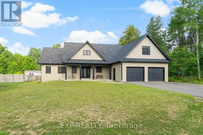 Prepare to be amazed by this stunning craftsman-style home that seamlessly blends modern farmhouse a...