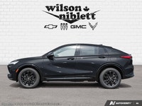 Sleek black exterior with modern design - Heated steering wheel for cold weather comfort - Adaptive... (image 2)