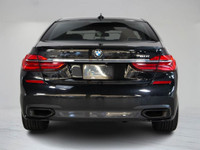 This sophisticated 2019 BMW 750i blends luxury and performance with its powerful V8 engine, striking... (image 6)