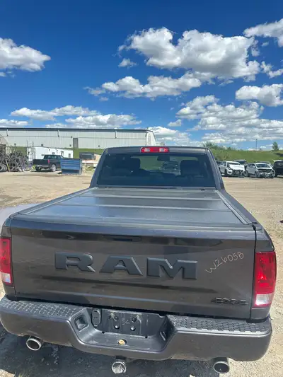 HARD TRI FOLD TONNEAU COVER - 2020 RAM 1500 - 5'7'' W26058 Calls only, please. We would love to talk...