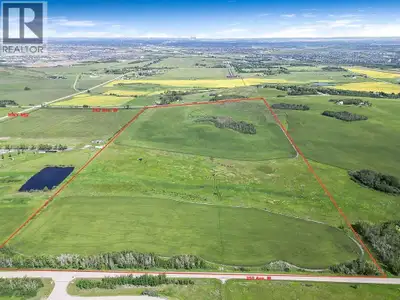 **STUNNING 80 ACRES of LAND with MOUNTAIN and CITY VIEWS and within MINUTES OF CALGARY** Great INVES...