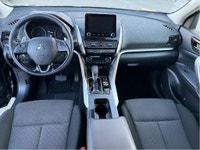 The 2024 Mitsubishi Eclipse Cross in a striking black finish is designed to tackle any road with its... (image 9)