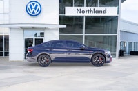 Propel your daily drive with the exceptionally dynamic 2024 Volkswagen Jetta GLI. This Deep Black Pe... (image 2)