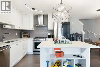 Welcome to this rare end-unit townhome with NO condo fees, perfectly situated fronting onto a park i...