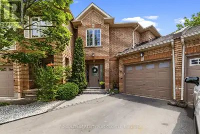 Welcome to this exceptional executive townhome in the highly sought-after Glen Abbey community, offe...